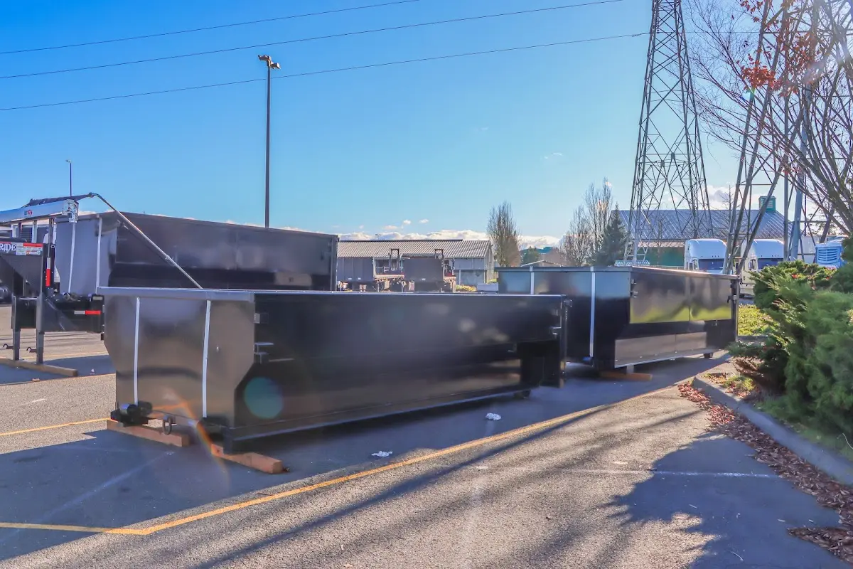 Roll-off dumpster ready for waste disposal at job site for Construction Dumpster Rental in Glenwood